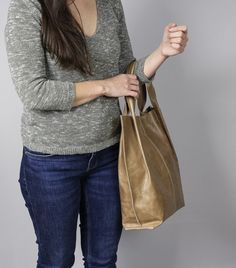 Tan Leather shoulder bag, Handbag - Tan Brown LEATHER TOTE Bag, Large Tote Bag, Tan tote bag, Leather purse, Leather Handbag Casual and simple tote made from high quality leather. This large tote bag is suitable for carrying everything in your everyday life. It has a magnetic closer. The bottom of the bag is lined with leather on the inside for extra support. The bag is unlined. * Highest quality Italian leather * Different colors * Waterproof * Easy to clean * Includes internal pockets for mobi Beige Soft Leather Hobo Tote Bag, Tan Tote Shoulder Bag With Leather Handles, Beige Tote Bag With Leather Lining, Dark Tan Tote Bag With Leather Handles, Tan Tote Bag, Dark Tan Leather-lined Tote Bag, Brown Leather Tote Bag, Tan Handbags, Simple Tote