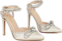 Glamorous Embellished Satin Heels, Satin Heels With Rhinestones For Prom, Satin Heels With Rhinestones And Pointed Toe, Glamorous Satin Heels For Prom, Glamorous Cream Heels For Evening, Evening Beige Heels With Rhinestones, Beige Rhinestone Heels For Evening, Glamorous Cream Ankle Strap Heels, Cream Glamorous Ankle Strap Heels