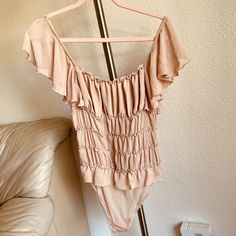 Free People Intimately Womens size Small Blush Bodysuit Ruffle Satin Like Sheer  | eBay Ruffle Bodysuit, Blush, Womens Sizes, Satin