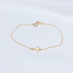 "14K gold cross bracelet ★ Cross charm is 14k solid gold, it is about 10mm x 6mm ★ The chain and all components are 14K solid yellow gold It comes with a 1/2\" extension chain. (If you order a 6\" bracelet, it will be a 6\" bracelet plus 1/2\" extension.) Please read our policies before you place your order. https://www.etsy.com/shop/SashJewelry/policy?ref=shopinfo_policies_leftnav To see other Mother daughter necklace set click here: https://www.etsy.com/shop/SashJewelry?section_id=12441134&amp Gold Hypoallergenic Cross Bracelet, Gold Cross Bracelet For Everyday Wear, Gold Cross Bracelets For Everyday, Everyday Gold Cross Bracelets, Everyday 14k Gold Cross Jewelry, Gold Cross Bracelet, Mother Daughter Necklaces Set, Other Mother, Gold Heart Bracelet