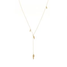 The Dd Necklace | Women's Gold Necklaces - Elvis et Moi Brass Jewelry With Tiny Beads In Dangle Shape, Adjustable Gold Lariat Necklace With Dangling Beads, Gold Teardrop Beaded Necklaces With Dangling Beads, Gold Teardrop Beaded Necklace With Dangling Beads, Gold Minimalist Jewelry With Dangling Beads, Minimalist Gold Jewelry With Dangling Beads, 14k Gold-filled Dangle Jewelry With Gold Beads, Adjustable 14k Gold-filled Necklaces With Gold Beads, 14k Gold-filled Yellow Gold Teardrop Necklace