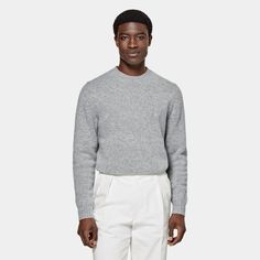 A classic crewneck knit for simple layering on any occasion, this versatile light grey wool sweater is an essential addition to any winter closet. Light Grey Crewneck, Perfect White Shirt, Tuxedo Accessories, Black Tie Formal, Flannel Suit, Custom Made Suits, Winter Closet, White Crewneck, Grey Crewneck