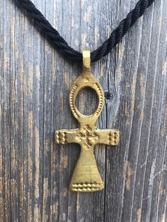 "A very Beautiful Handmade Ethiopian Orthodox Church Cross Pendant. Particularly among Ethiopia Orthodox Church followers to wear a cross implied to be protected by the God as well as to show they're devoted Christian. Dimensions: 2.19\" (55.5 mm) - Height 1.20\" (30.5 mm) - width" Ethiopian Necklace, Ethiopian Coptic Cross, Ethiopian Orthodox Cross, Ethiopian Orthodox Mezmur, Ethiopian Orthodox Church, Hallmarked Ethiopian Opal Pendant Jewelry, Orthodox Church, Christian Cross, Red Green Yellow