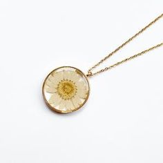 White Pressed Flowers Necklace For Wedding, Gold Dainty Flower Necklace With Pressed Flowers, Delicate Necklace With Pressed Flowers, Delicate Round Necklaces With Pressed Flowers, Delicate Pressed Flower Jewelry, Dainty Flower Necklace With Pressed Flowers In Round Pendant, Delicate Round Necklace With Pressed Flowers, Dainty Gold Flower Necklace With Pressed Flowers, Delicate Gold Necklace With Pressed Flowers