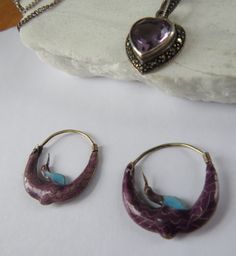 A gorgeous pair of cloisonne arched crane earrings in vermeil (gold wash), with purple and turquoise blue enamel. Probably early Laurel Burch earrings - if you know how to verify (or not), I'd love a convo! In good to very good condition - just gently used and loved - a few small deformities here and there but no loss of enamel or function. For items shipped to places outside of the US, buyers pay all costs related to the import of the items, including customs fees and taxes. Vintage Enamel Gemstone Jewelry, Vintage Enamel Jewelry With Gemstone, Traditional Hallmarked Enamel Jewelry, Vintage Turquoise Enamel Jewelry, Elegant Enamel Hoop Jewelry, Elegant Drop Earrings With Inlay, Enamel Teardrop Jewelry With Matching Earrings, Antique Handmade Crescent Jewelry, Handmade Crescent Antique Jewelry