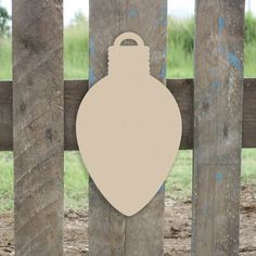 a wooden fence with a brown and white decal on it