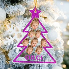 a christmas tree ornament with photos of the same child's faces on it