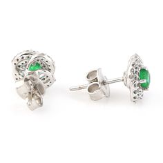 Modern style Gemstone Jewelry. These Earrings are made of gold and Gemstone Diamond material and are capable of reflecting some light to produce a natural glow . a unique feature found only in premium jewelry. These Earrings are handmade in 14k White Gold : 2. 294 grams , and Diamond : 0. 23 cts Emerald : 0. 63 cts (OPS-20434)  This jewelry is made by hand featuring detailed workmanship. Be careful to avoid dropping or banging as physical impacts can result in damage to the pieces including stones falling off. To care for your or jewelry, take caution to keep away from harsh chemicals, Perfume, and Water. You may wipe with a clean polishing cloth to maintain a beautiful shine. Keep in mind that extensive exposure to saltwater, sunlight, or harsh chemicals can permanently damage your handma Elegant White Gold Earrings For May Birthstone, Elegant May Birthstone Earrings With Halo Design, Elegant Halo Earrings For May Birthstone, Elegant Earrings With Halo Setting For May Birthstone, Diamond Earrings For May Birthstone, Elegant May Birthstone Earrings With Halo Setting, Diamond Gemstone Earrings For May Birthstone, Diamond Flower-shaped Gemstone Earrings, White Gold Flower Shaped Earrings With Gemstones