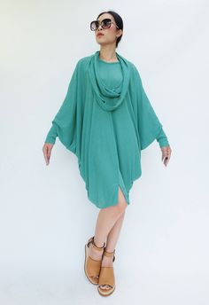 "🚚..ALL ORDERS ARE SHIPPED VIA DHL EXPRESS MAIL If you could only bring one dress on vacation, this would be it! Easy fitting wide body with long length sleeves, a scarf attached at neckline -- play with the many different ways of wearing it! Loop it around your neck in a figure, let it hang asymmetrically off to one side; open the scarf in half to criss-cross it around the neck. It's all up to you-- dress it up, dress it down, layer it! So versatile, it will have you wondering how you ever got Oversized Solid Color Poncho With Batwing Sleeves, Beach Cover-up With Batwing Sleeves, Oversized Batwing Sleeve Poncho, Turquoise V-neck Kaftan For Summer, Cozy One-size Poncho With Batwing Sleeves, Scarf Dress, Long Maxi Skirts, Wide Body, Tunic Length