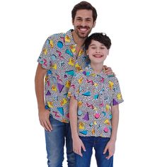 Your family is looking cool and concert ready in this stylish Family Matching MTV collared button up shirt! Enjoy your favorite music videos and reality tv shows in this soft and comfy tee featuring an all-over print of the iconic MTV logo with a neon retro shape design! With both kids and adult sizes, the whole family can rock out to their favorite songs in style! Trendy Summer Shirt For Concerts, Short Sleeve Shirt For Spring Concert, Spring Concert Short Sleeve Shirt, Retro Shirt For Summer Concerts, Retro Summer Shirt For Concerts, Music-themed Relaxed Fit Tops For Summer, Summer Concert Short Sleeve Shirt, Retro Unisex Short Sleeve Shirt, Multicolor Casual Tops For Concert