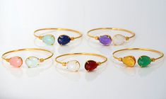 This bangle is a great gift for any mother. This adjustable bangle bracelet features two birthstones of your choice prong set in gold or silver plated brass. We love that this can gently be altered for the perfect fit on any wrist and is easily stackable with other jewelry or bangles. The gemstone size is 12 mm x 15 mm (0.4'' x 05''). METAL GOLD. 18k gold-plated brass. SILVER. Sterling silver plated brass. BIRTHSTONES I work with a variety of natural and synthetic gemstones to correlate to speci Metal Wrapping, Adjustable Bangle Bracelet, Jewelry Metal, Adjustable Bangle, Letter Charms, Metal Jewelry, Bangle Bracelet, Prong Setting, Bangle Bracelets