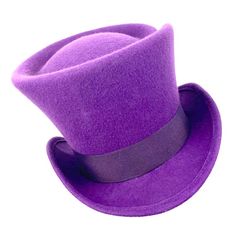 Amazing purple top hat made with wool felt and embellished with a  grosgrain ribbon. You can make your hat with your favorite color by choosing it from my Wool felt color card.This hat is inspired by the Charlie and the Chocolate Factory's movie and its character Willy Wonka, and also in the magic universe of  Alice in wonderland movie with your madd hatter's friend. Measurements in centimeters are 31 x 25. Crown height 15. Brim length 5.5. These measurements may have some slight variation depen Purple Top Hat, Alice In Wonderland Movie, Magic Universe, Barbie 12 Dancing Princesses, Descendants Dr, 12 Dancing Princesses, Mad Hatter Hat, Purple Hat, Custom Top