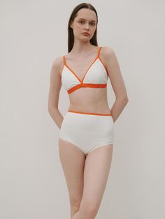 This is a feminine and modern bikini by 320SHOWROOM that is made out of high quality and sturdy fabric. With unique design detail and trendy mood, you can style it for your modern and casual daily outfit.- Color contrasting piping line detail- High waistline- Inner bra pad and triple hooks- Adjustable shoulder strap length Chic White Seamless Bottoms, Modern Fitted High-waist Swimwear, Chic Seamless White Bottoms, Modern High Waist Swimwear For Summer, Fitted White Bottoms With Lined Body, Modern White Swimwear For Beach, White High Waist Bottoms With Lined Body, Modern White Swimwear For Summer, White Lined Bottoms For Poolside