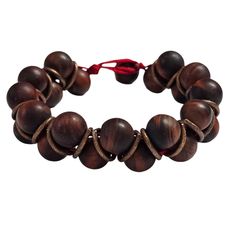 Details:- 10mm Matte Red Tigers Eye- Size: 7.75"- Copper accents- Macramé toggle closure- Genuine natural stones MATERIAL: Sturdy red adjustable cord; These are genuine beads. For long-lasting wear for years to come, we suggest not to wear this in the ocean, shower, or in the pool due to the harsh chemicals. Tigers Eye is an incredible healing stone and can be used in many ways to; align certain chakras, balance the body, sharpen the mind, and help you unpack and put away any emotional baggage y Adjustable Wooden Beads Bracelet, Adjustable Spiritual Bracelet With Wooden Beads, Red Adjustable Artisan Bracelet, Red Beaded Bracelets With Adjustable Cord, Artisan Red Adjustable Bracelet, Adjustable Red Beaded Bracelets For Meditation, Casual Adjustable Jewelry With Large Beads, Artisan Adjustable Round Bracelet, Adjustable Large Beaded Casual Jewelry