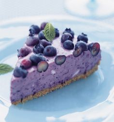 a slice of blueberry cheesecake on a plate