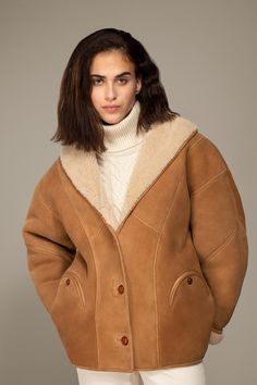 Shearling Outerwear With Faux Fur Lining, Long Coat, Sheepskin Long Coat With Faux Fur Lining, Beige Sheepskin Fur Coat For Fall, Beige Shearling Outerwear For Cold Weather, Lambswool Outerwear With Faux Fur Lining For Fall, Fall Outerwear With Fleece Lining And Sheepskin, Beige Shearling Outerwear With Faux Fur Lining, Fall Sheepskin Outerwear With Fleece Lining, Brown Shearling Fur Coat For Work