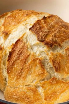 a loaf of bread sitting on top of a white plate