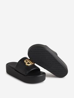 Sandals by Balenciaga; Sandals; Nappa leather; Flip-flop sandal; Monaco BB gold on top; Slip-on design; Rounded toe; Leather sole; Sole height: 5 cmMade in Italia100% LeatherGender: WomenMaterial: 100% LEATHERColor: FLIP-FLOP SANDALMade in: ITProduct ID: 788494WB7E1_1080*Import tax/duty will be calculated at checkout (If applicable) Balenciaga Sandals, Nappa Leather, Flip Flop, Flip Flop Sandals, Monaco, Balenciaga, Flip Flops, Slip On, Sandals