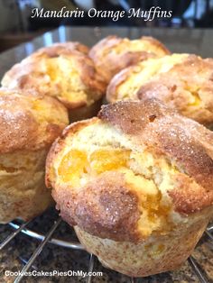 several muffins cooling on a wire rack