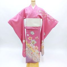 A classic pink vintage silk Furisode Kimono with floral design. Brighten up you day wearing this kimono or by hanging it as a display to enjoy everyday. Item: Furisode Silk Kimono No. frn288 Size: US  L  /  Length 66 inch (168.5cm), Width 27 inch (69cm). Design :  Floral Condition: Used, Very Good. Please check the photos. Need a Obi Sash? Find it here: https://www.etsy.com/shop/KimonoFujiyamarock?ref=seller-platform-mcnav§ion_id=13757607 Shop the entire collection https://fujiyamarock.etsy.com Pink Kimono For Spring Wedding, Pink Kimono With Kimono Sleeves For Tea Ceremony, Vintage Floral Print Kimono For Wedding, Spring Wedding Pink Kimono, Traditional Pink Kimono For Wedding, Pink Kimono For Tea Ceremony, Traditional Spring Wedding Kimono, Fitted Pink Kimono, Traditional Pink Kimono For Spring