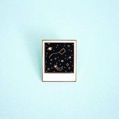 Add a little dose of the universe to your #PinGame!  Do you often find yourself looking up at the night sky? Do you love outer space and photography? If so, then this pin is perfect for you! Wear it on clothes, outerwear, or even tote bags. Its the perfect accessory for photographers, star gazers, and pin addicts!  Details: - 1.25 tall cloisonné (hard enamel) pin - Polished gold metal - 2 Rubber backings - THE UNCOMMON PLACE back stamp - Illustrated by Katie Thierjung  Shipping: - USPS First ... Backpack Illustration, You Are My Moon, Backpack Pins, Astuces Diy, Evening Jewelry, Jacket Pins, Cocktail Jewelry, Pin Game, Pretty Pins