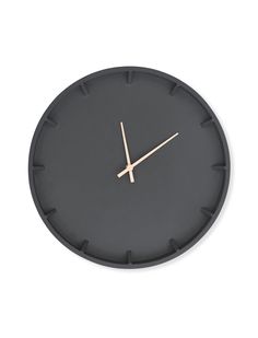 a black clock with gold hands on a white background