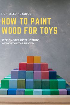 colorful wooden blocks stacked on top of each other with the words how to paint wood for toys