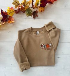 Embroidered Thanksgiving Sweatshirt, football season shirt, Fall Cozy Sweatshirt, Embroidered Sweatshirt, Womens Fall Outfit, Fall Sweater x PeckShirt. Transform Your Photo into an Everlasting Memory with Best Custom Hoodies/Sweatshirt/T-Shirt Surprise your special someone with an unforgettable gift! Our Best Custom personalized apparel are not just ordinary apparel; they are a creative rendition of your cherished moments. Our unique process turns your favorite photo or collage into a sk ... Thanksgiving Sweatshirt, Fall Sweater, Personalized Clothes, Outfit Fall, Style Hoodie, Embroidered Sweatshirt, Custom Hoodies, Cozy Sweatshirts, Embroidered Sweatshirts