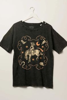 Rodeo Cowgirl Distressed Oversize Graphic Tee | ShopPromesa Vintage Distressed T-shirt For Festivals, Western Style Washed Cotton Tops, Vintage Washed T-shirt For Festival, Festival Washed Graphic T-shirt, Festival Washed Graphic Tee T-shirt, Festival Graphic Tee T-shirt Washed, Festival Graphic Tee With Washed Detail, Vintage Stonewashed Tops For Fall, Festival Graphic Tee With Vintage Wash