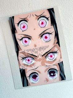 an image of three anime eyes on a piece of paper with the eyeballs drawn