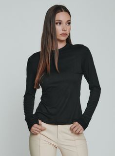 black-1003 Black Long Sleeve Top With Thumbholes For Layering, Solid Color Turtleneck Long Sleeve Top For Work, Solid Turtleneck Long Sleeve Top For Work, Black Long Sleeve Top With Thumbholes For Fall, Black Tops With Thumbholes For Fall, Sleek Long Sleeve Tops For Fall, Black Ribbed Long Sleeve Top For Spring, Everyday Solid Color Stretch Long Sleeve Top, Classic Long Sleeve Tops With Minimal Stretch