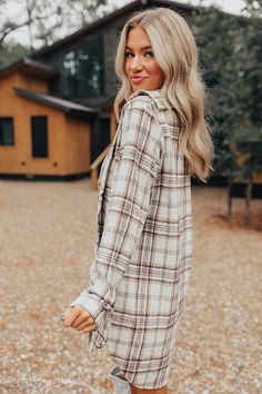 - Plaid season has officially arrived with this cozy dress! - Soft unlined material with a cream, brown, and serenity hued plaid print - A collared neckline - A button-up front - Long, loose sleeves with button closure cuffs - Hidden side pockets - A relaxed silhouette that ends in a mini dress length hemline Plaid Tunic Dress, Cozy Dress, Plaid Tunic, Fall Plaid, Loose Sleeves, Hoodie Material, Country Girl, Country Outfits, Women Clothing Boutique