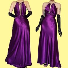 Purple satin evening gown with a tie at the back of the neck, a padded bust, diamanté detail broach at the front & a zip up the back UK 8, 10 & 12 ✨Condition: No faults or marks ✔️ ✨Size: UK 8, 10 & 12 ✨Measurements: UK 8 Waist - 27" Bust - 33" Hips - 42" UK 10 Waist - 29" Bust - 35" Hips - 44" UK 12 Waist - 31" Bust - 37" Hips - 46" ✨Label: Niki Livas  ✨Length: Maxi - floor length on the 5'8 model  ✨Model size: 10 ✨Model height: 5'8 Any questions please do not hesitate to ask These are vintage Satin Evening Dress, Evening Dresses Uk, Satin Evening Gown, Satin Evening Dresses, Purple Satin, Vintage 2000s, Dresses Uk, Purple Dress, Evening Gown