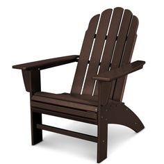 a brown adiron chair sitting on top of a white background