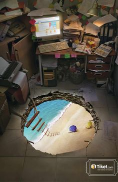 an image of a computer desk in the middle of a room filled with clutter