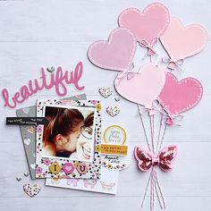 a scrapbook page with heart shaped balloons