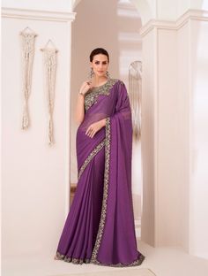 This exquisite designer saree is perfect for weddings and parties, combining timeless elegance with contemporary style. The saree is crafted from luxurious silk chiffon, featuring intricate sequence embroidery work that adds a shimmering allure to the soft, flowing fabric. With a generous length of 6.5 meters, it drapes beautifully, exuding grace and sophistication. The blouse, made from Banglori silk net, is adorned with delicate thread and sequence embroidery, enhancing the overall charm of the outfit. This saree is a stunning choice for anyone seeking to make a statement at weddings or festive gatherings.

#DesignerSaree #WeddingWear #SilkChiffon #SequenceEmbroidery #BridalFashion #PartyWear #ElegantSaree #BangloriSilk #TraditionalOutfit #SareeLove #EthnicStyle #IndianFashion #FestiveLo Fitted Chiffon Blouse For Reception, Fitted Chiffon Blouse With Zari Work, Fitted Purple Embellished Blouse Piece, Embellished Purple Georgette Blouse Piece, Purple Embellished Pre-draped Saree In Georgette, Embellished Purple Georgette Pre-draped Saree, Fitted Purple Georgette Blouse Piece, Purple Fitted Georgette Blouse Piece, Saree Ready To Wear