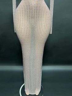 This Crystal Mesh Dress is ready to ship and will be processed in 3-5 business days in blue and red, silver gold, black. It is a full rhinestone dress, with crystals covering the entire dress. Plus and custom sizes are available, with a custom fee to order. You can also request other colors, with an email for a quote. The item takes around 30 days to make, but you can add a rush fee to order if needed. This dress is perfect for any special occasion, such as prom, birthdays, or celebrations. It i Crystal Mesh Dress, Men Athletic Wear, Mens Athletic Wear, Custom Boots, Waist Trainer Corset, Polyethylene Terephthalate, Makeup Stain, Rhinestone Dress, Birthday Party Dress