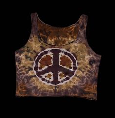 Peace sign tie dye crop tank MADE TO ORDER -product will differ slightly than the photo shown as no one tie dye is the same -100% cotton -made with professional procion dyes Casual Brown Tank Top For Festival, Brown Hippie Festival Tops, Brown Cotton Crop Top Tank Top, Brown Sleeveless Hippie Top, Brown Cropped Cotton Tank Top, Cropped Brown Cotton Tank Top, Casual Brown Crop Top For Festival, Bohemian Brown Cotton Crop Top, Brown Bohemian Sleeveless Crop Top