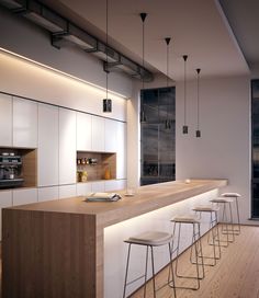 the modern kitchen is clean and ready to be used as a bar or dining area