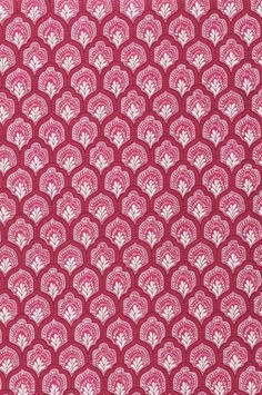 a red and white pattern on fabric