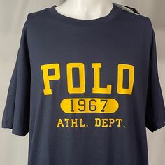 Brand New With Tags! Smoke And Pet Free Home Polo By Ralph Lauren Crewneck Graphic T-Shirt Navy T-Shirt With Yellow-Gold Printed Graphic Men’s Size 1xb // Xl Big 100% Cotton Thanks For Checking It Out! I Ship Every Single Business Day! Navy Short Sleeve Top With Letter Print, Navy Crew Neck Tops With Text Print, Casual Navy Shirt With Letter Print, Classic Blue Tops With Letter Print, Navy Logo Print Crew Neck Top, Classic Blue T-shirt With Letter Print, Navy Crew Neck Top With Logo Print, Ralph Lauren Crewneck, Ralph Lauren Tshirt