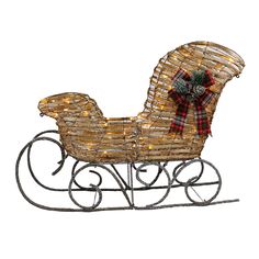 a christmas sleigh with lights and a bow on the top is shown against a white background