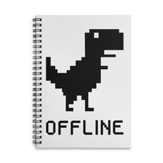 a black and white spiral notebook with the words offline on it, in front of an image of a dinosaur