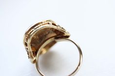 This is a gorgeous vintage resin ring that is slightly adjustable. They fit a size 5.5-7 best. They are gold plated and really great quality. The colors are so vibrant. This ring is from about the 1950s, but hasn't been worn. This style comes in green or red. --Shop Policies-- Please be sure to read our shop policies before making your purchase. Thank you! https://www.etsy.com/shop/diamentdesigns/policy Vintage Gold Engraved Ring, Vintage Gold Opal Cabochon Ring, Vintage Gold Opal Ring Gift, Vintage Gold Opal Ring For Gift, Vintage Gold Moonstone Ring For Anniversary, Vintage Gold Moonstone Anniversary Ring, Vintage Opal Open Ring For Gift, Vintage Gold Moonstone Ring For Gift, Vintage Gold Opal Promise Ring