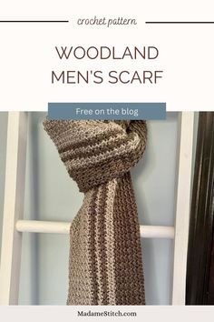 a knitted scarf hanging on a ladder with the text woodland men's scarf free on the blog