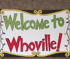 a sign that says welcome to whowvillee