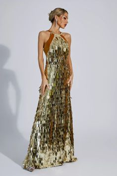 Glamorous Maxi Dress With Tie Back For Gala, Glamorous Halter Dress With Back Opening For Prom, Gold Backless Halter Dress For Party, Fitted Halter Neck Dress For Gala, Backless Dress With Tie Back For Gala, Gold Halter Neck Sequined Dress, Glamorous Backless Evening Dress With Tie Back, Glamorous Evening Maxi Dress With Tie Back, Party Maxi Dress With Strappy Back