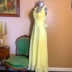 Amazing Find. Vintage 1960's/1970’s Yellow Ruffled Halter Gown. Cotton Blend. Bow Tie On Back. See Pics For Material Detail. I Love The Open Back. Very Pretty Vintage Dress From The 70’s In Excellent Like New Condition. Hurry This Wont Last! Sz 11/12 Mae By Courier California. Yellow Vintage Dress, Halter Gown, Vintage Yellow, Vintage Dress, Yellow Dress, Bow Tie, Halter Dress, Vintage Dresses, Cotton Blend