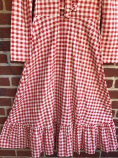 "Adorable cotton soft flannel like picnic dress/labeled size 6 made in USA measurements Pit to wrist 16 1/2\"/pit to pit 16 1/2\"/waist 14\"/length (shoulder to bottom) approx 50\"/Soft and cozy/adorable bottom ruffle/10 front button access/smoke free environment(04)" Cotton A-line Maxi Dress With Ruffles, Fitted Ruffle Maxi Dress For Picnic, Fitted Ruffled Maxi Dress For Picnics, Retro Cotton Plaid Dress For Picnic, Plaid Cotton A-line Dress, Cottagecore Midi Dresses For Picnic, Cottagecore Midi Length Dresses For Picnic, Cottagecore Style Midi Dress For Picnic, Retro Cotton Plaid Dress